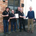 Ron presents Just Beer with the Pub of the Year award